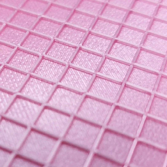 Pink rhinestone tumbler template with grid design for crafting