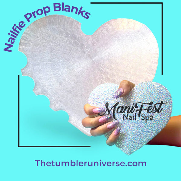 Heart-shaped rhinestone nail prop blanks for ManiFest Nail Spa with glittery nails