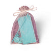 Turquoise flatback flipper tool in purple organza bag, perfect for rhinestone tumbler crafting