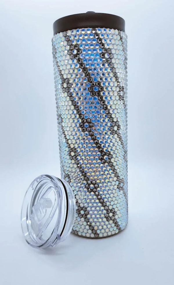 Rhinestone-embellished tumbler with blue and silver design, featuring a clear lid and brown top.