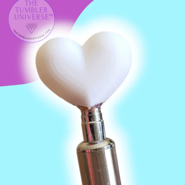 White heart-shaped tumbler flipper tool for rhinestone crafting with metallic handle