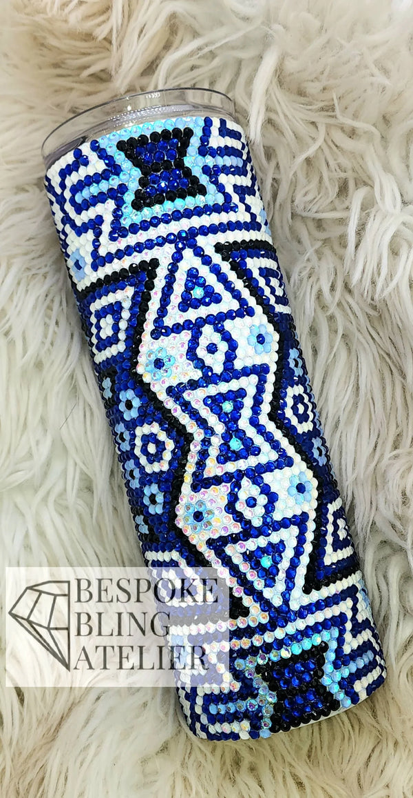 Blue and white rhinestone tumbler with geometric pattern, perfect for bling crafting projects.