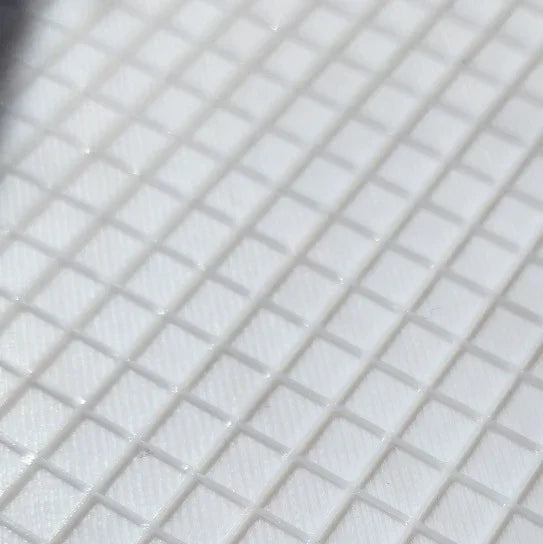 Close up of white rhinestone flipping tray from the tumbler universe