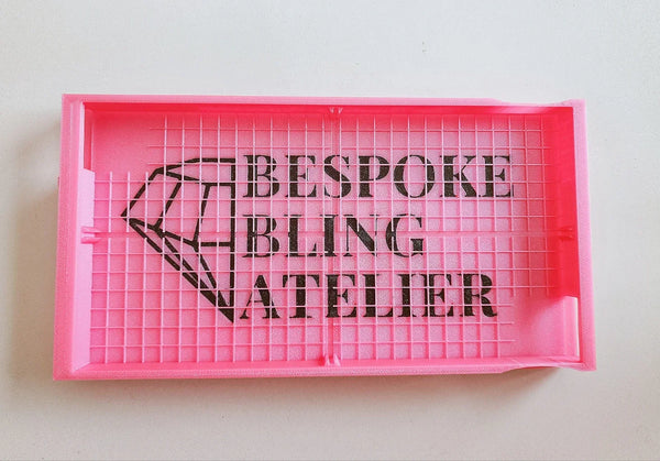 Custom logo in rhinestone tray