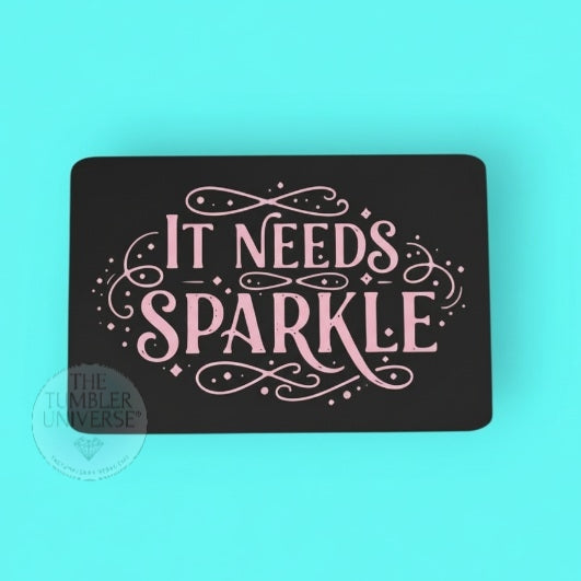 Black card with pink text 'It Needs Sparkle' on a teal background
