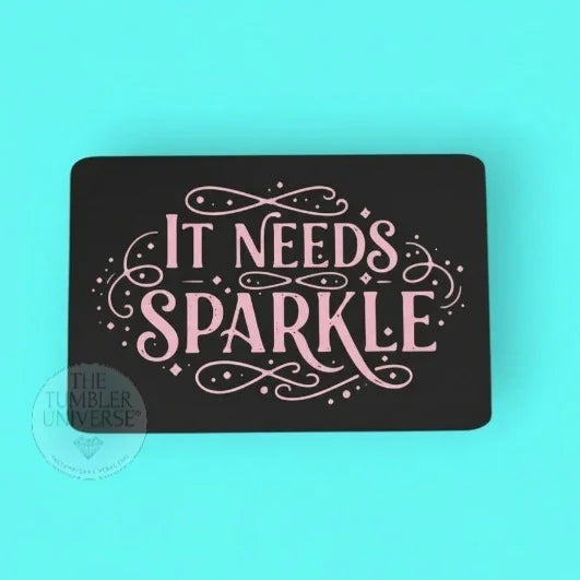 Black card with pink text 'It Needs Sparkle' on a teal background