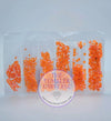 Vibrant orange rhinestones in clear compartments, perfect for tumbler bling and crafting projects.