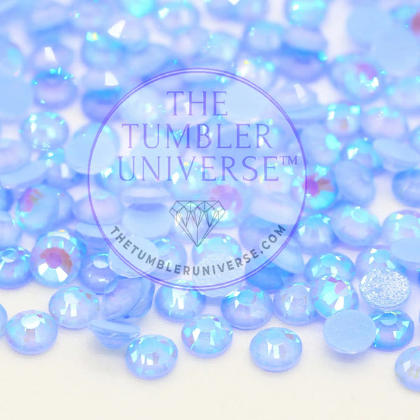 Iridescent blue rhinestones for crafting and tumblers, sparkling with holographic shine.