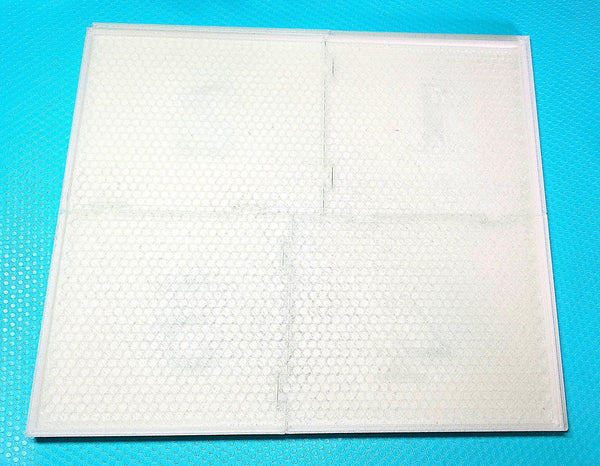 Clear rhinestone tumbler template sheet with grid lines on blue textured background