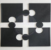 Black textured tumbler grip pads with circular cutouts for secure handling during rhinestone crafting