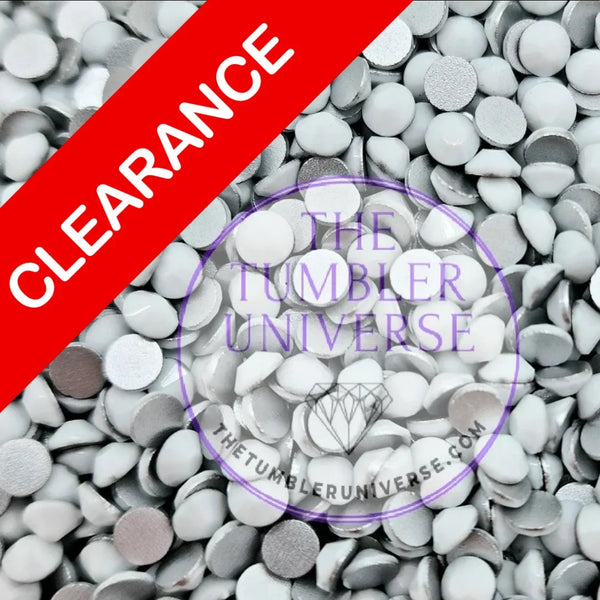 Clearance rhinestones for tumblers, flatback crystals in silver and white, perfect for crafting and bling projects.